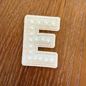 Pearl letter E patch